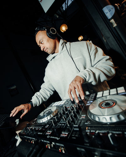 DJ playing electronic music at Rudi's bakery rave