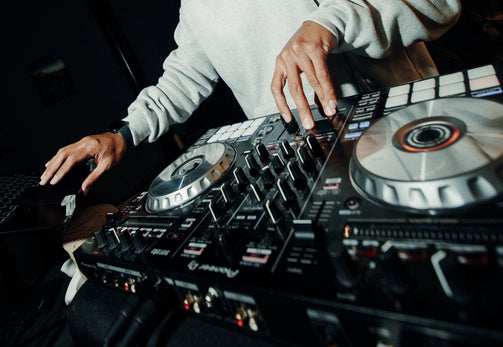 DJ playing electronic music at Rudi's bakery rave